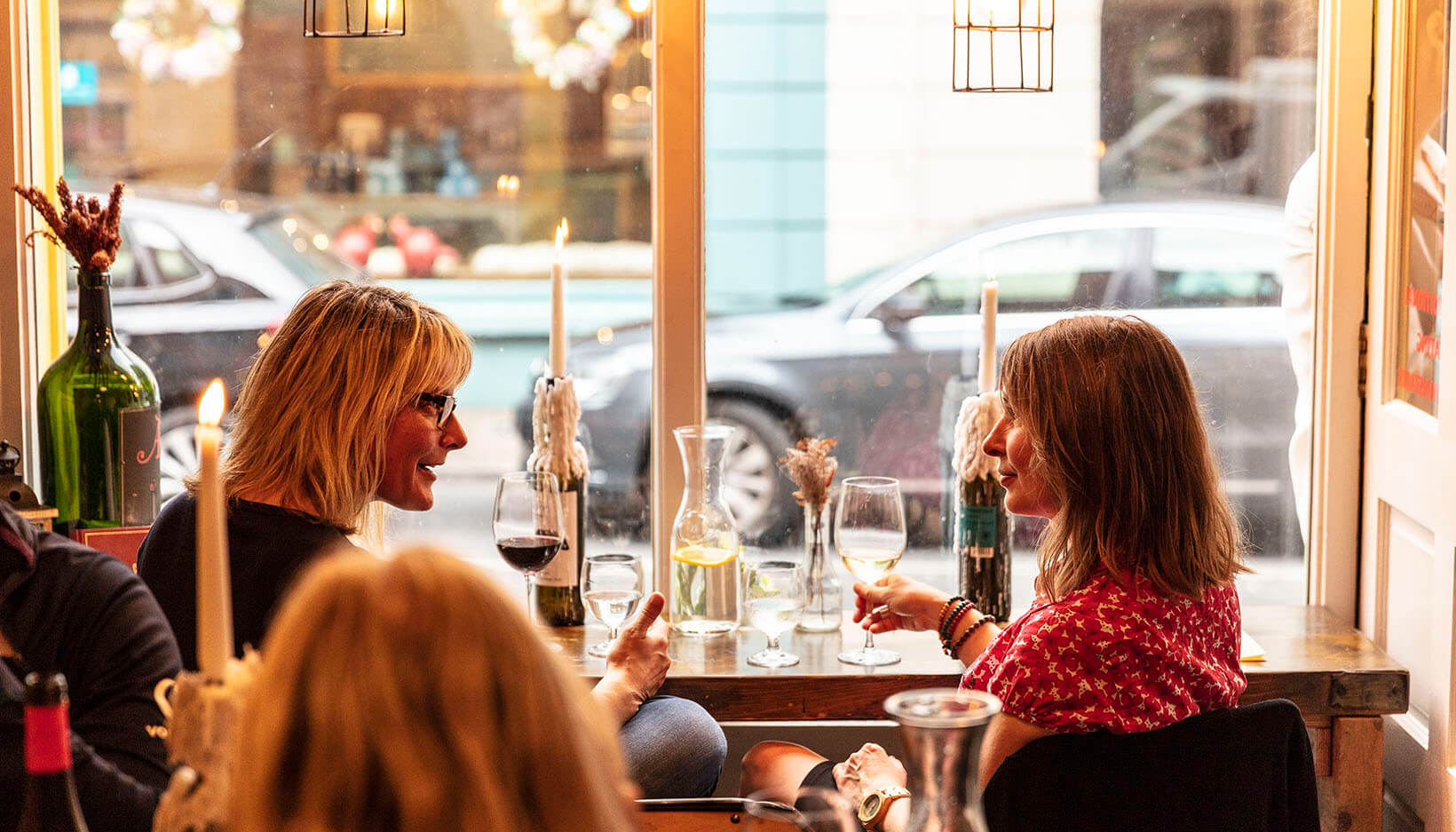 women drinking wine